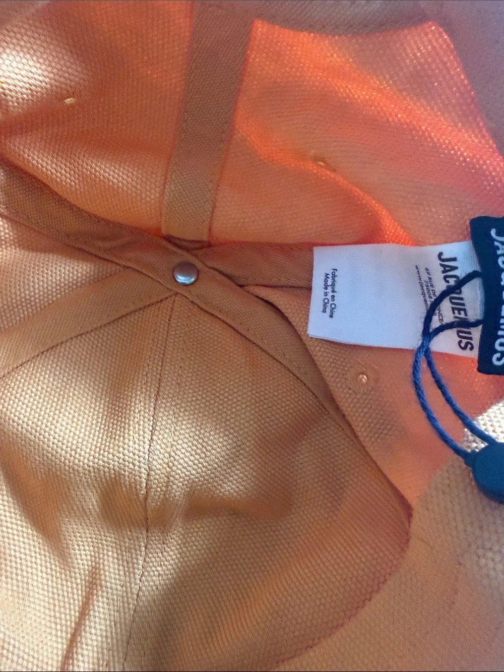 Jacquemus Orange Cap with Pink Logo Graphic